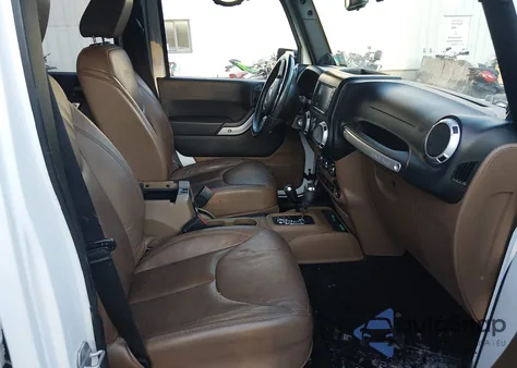 2013 Jeep Wrangler Unlimited Sahara z USA, uszkodzony, nr VIN 1C4BJWEG7DL706983